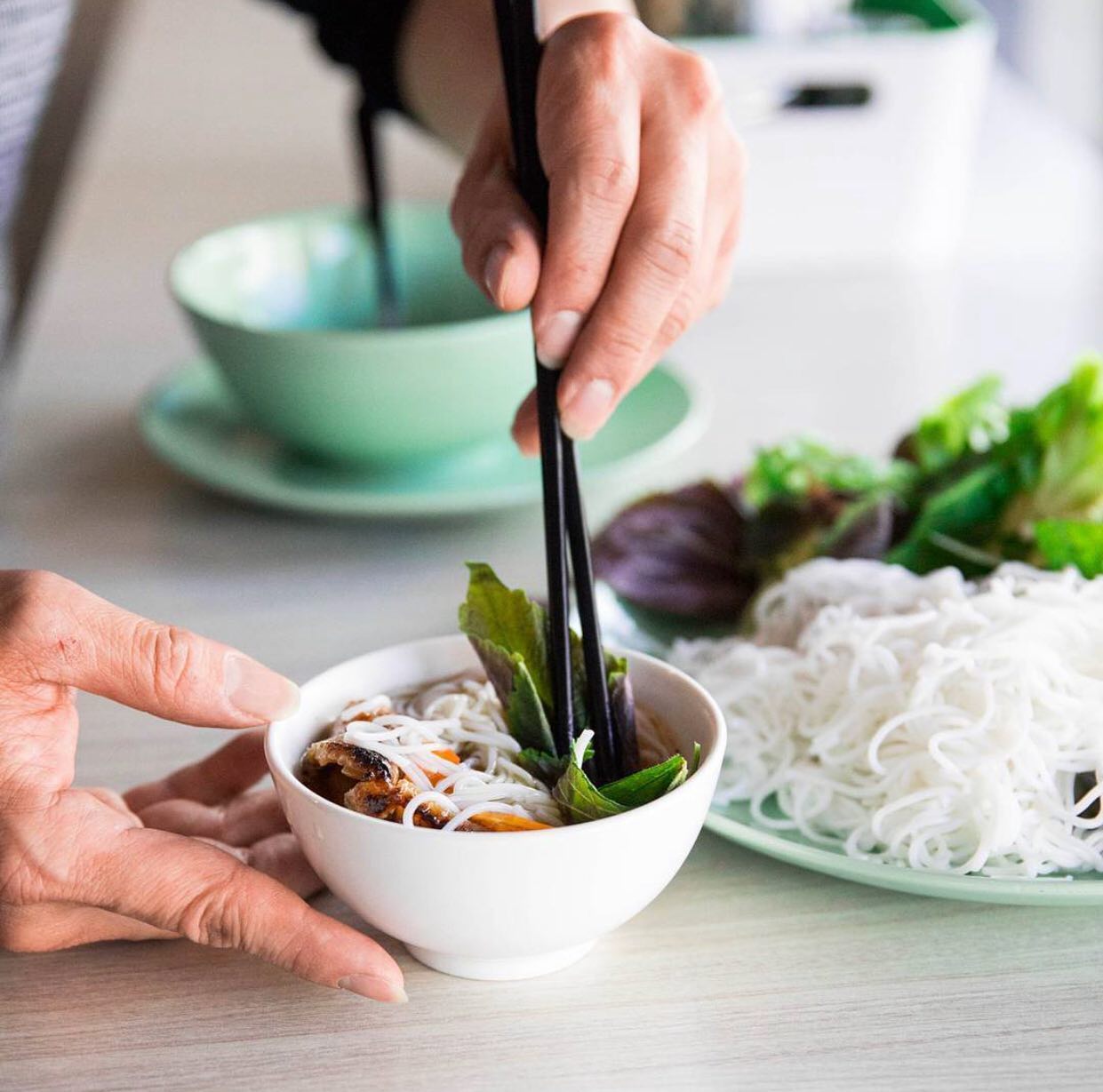 Our specialty dish, Bun Tron, served with charcoal grilled pork or chicken, vermicelli, herbs, lettuce, and special sauce. Best enjoyed with a glass of red, we're licensed and ready for your visit. #hanoirose